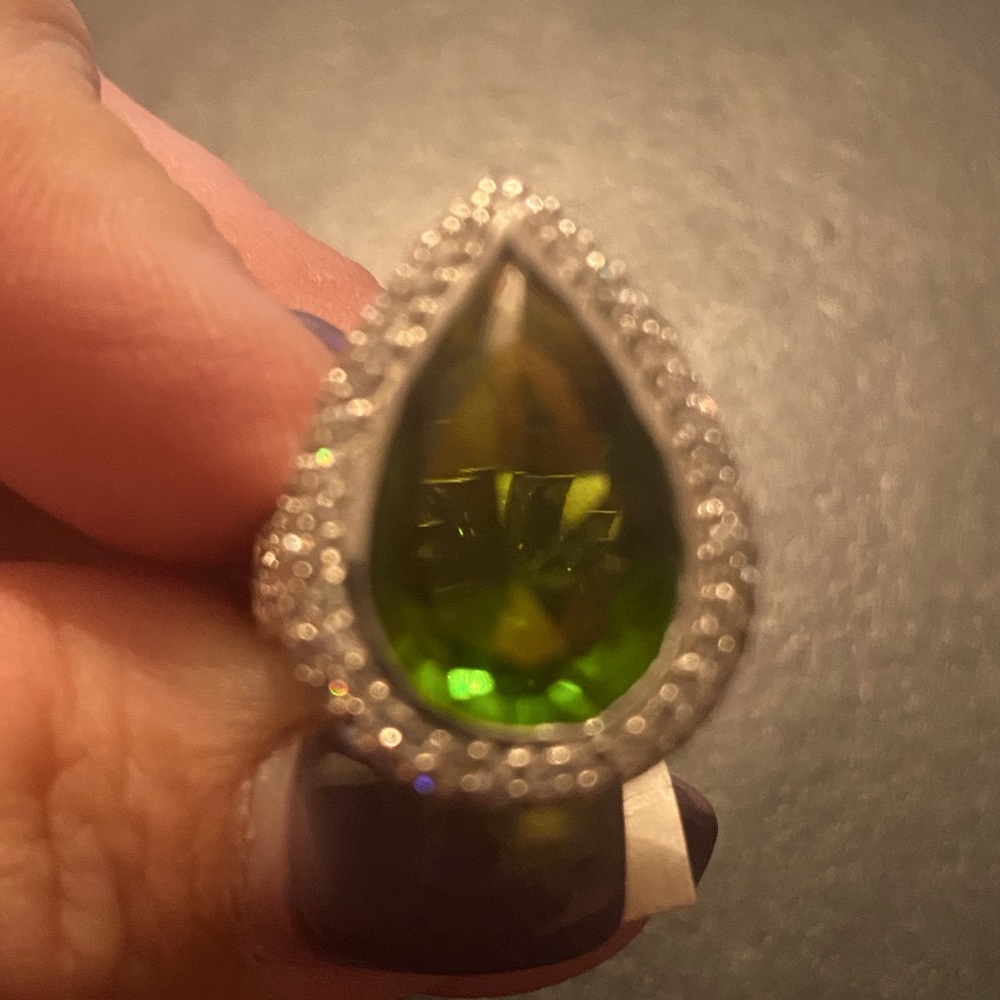 NWT sterling silver band, faux emerald surround with diamond clusters